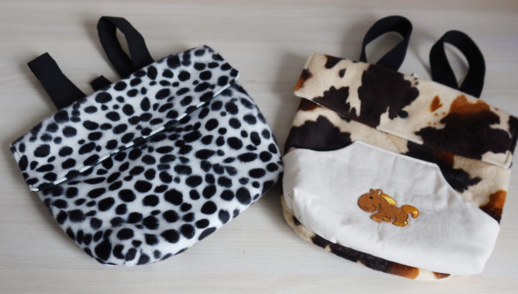 Sac a dos blanc et noir, motif vache pour enfant